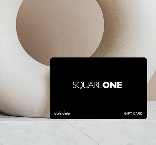 Square One gift card in front of a vase