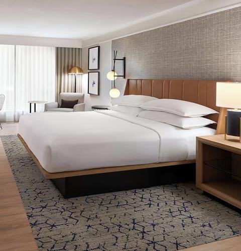 Comfortable hotel room offering a convenient and relaxing stay for visitors near the shopping centre