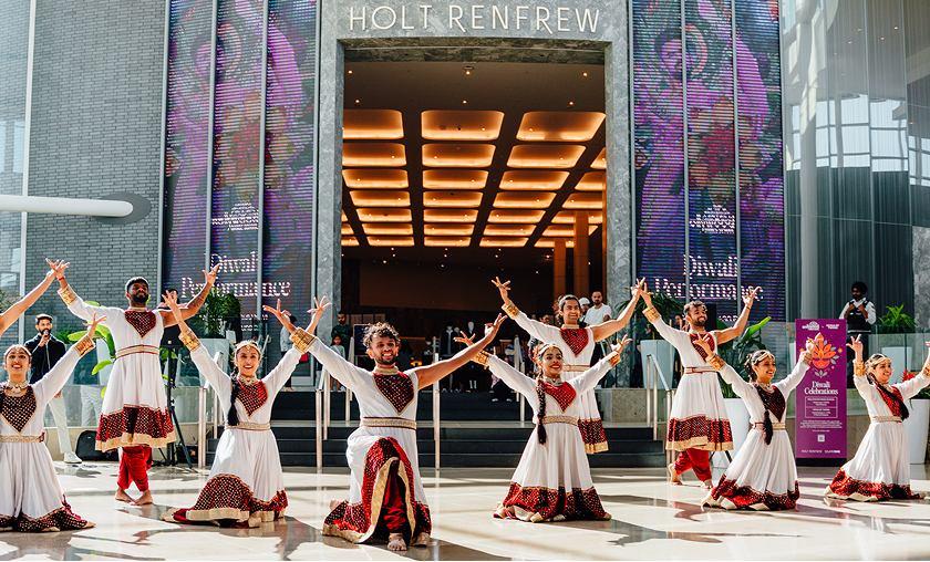 Cultural performance inside the mall highlighting community events and shared public spaces