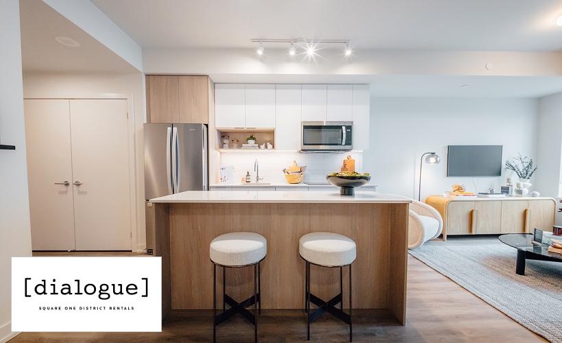 Modern rental apartment interior at Square One District featuring kitchen and living space